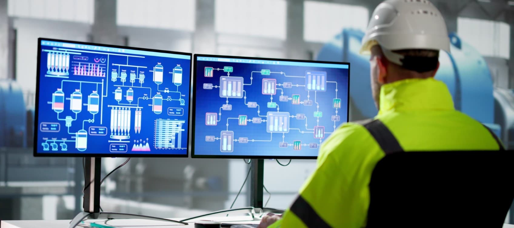 SCADA system and man at desk